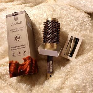 Amike nano tech pro hair brush, comes with clips for easy drying, originally$45.